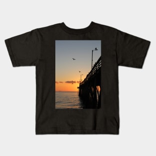 Virginia Beach Pier with flying Seagulls at Sunrise Kids T-Shirt